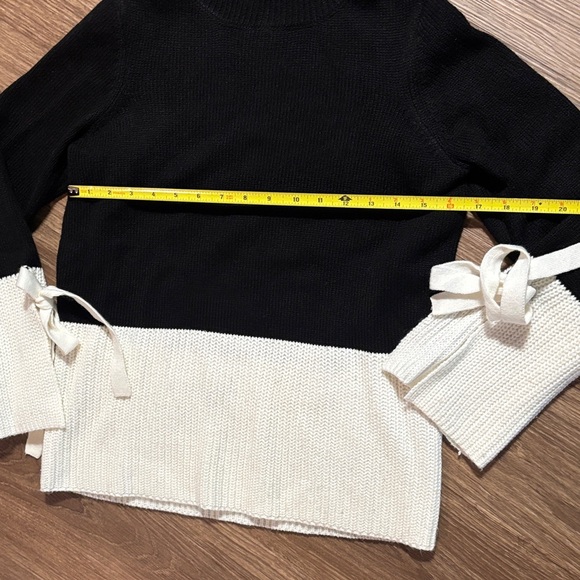 Black and White Women's Sweater with Bow Accents - Picture 3 of 6
